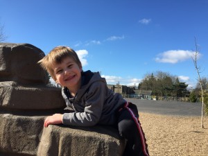 sam climbing at the park